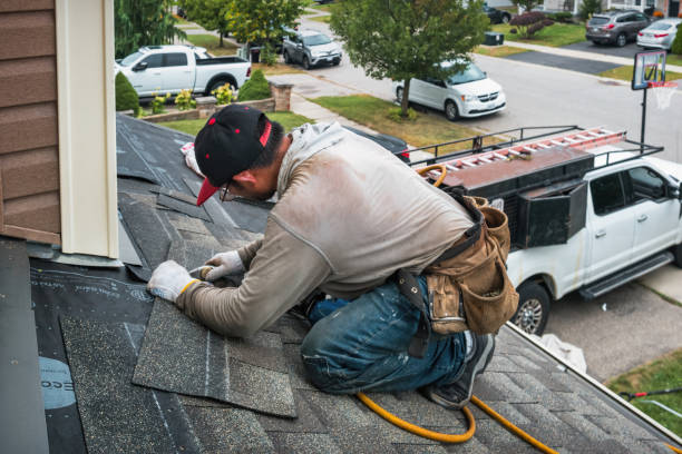 Professional Emergency Roof Repair technician working in Clark Fork, ID